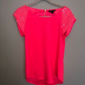 Women’s bright pink top